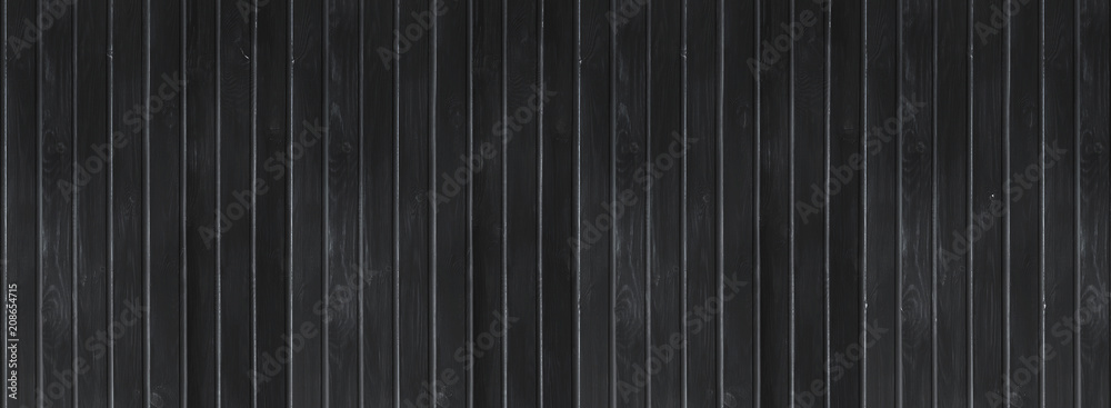 Black wood vintage or grungy background. Wooden old texture as a retro pattern layout.