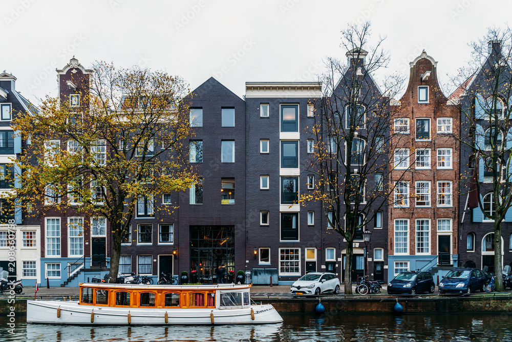 Architecture Of Dutch Houses Facade and Houseboats On Amsterdam Canal