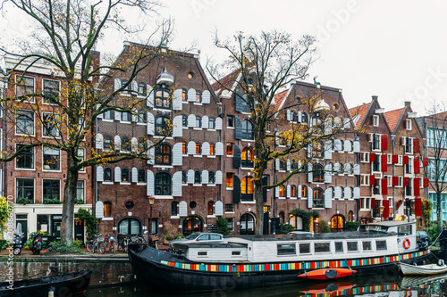 Architecture Of Dutch Houses Facade and Houseboats On Amsterdam Canal