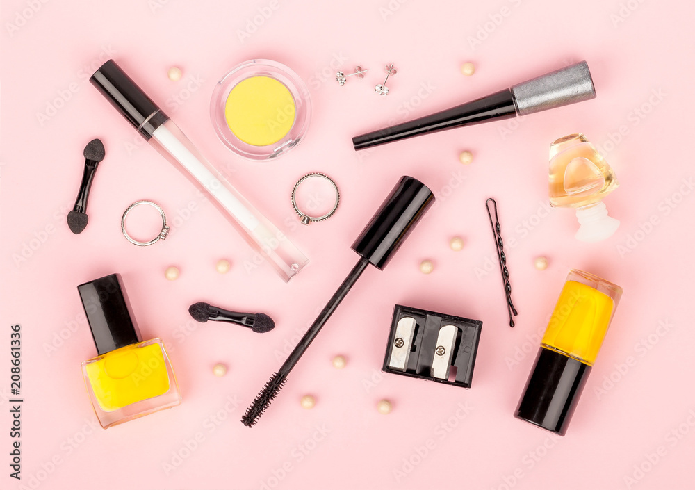 set of professional decorative cosmetics, makeup tools and accessory on blue background. beauty and fashion concept. flat lay composition, top view set of professional decorative cosmetics, makeup tools and accessory on blue background. beauty and fashion concept. flat lay composition, top view