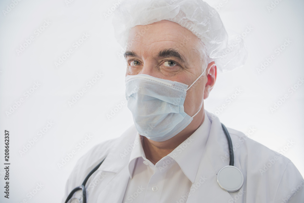 doctor in medical mask close-up, male
