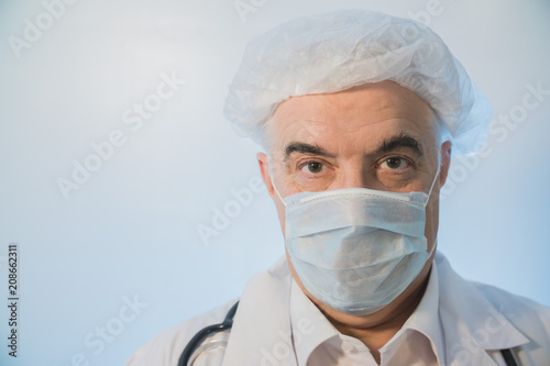 doctor in medical mask close-up  male  