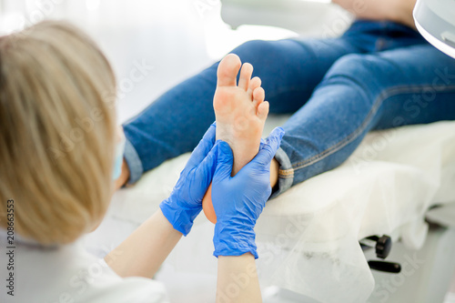 Podiatry doctor. Treatment of feet and nails.