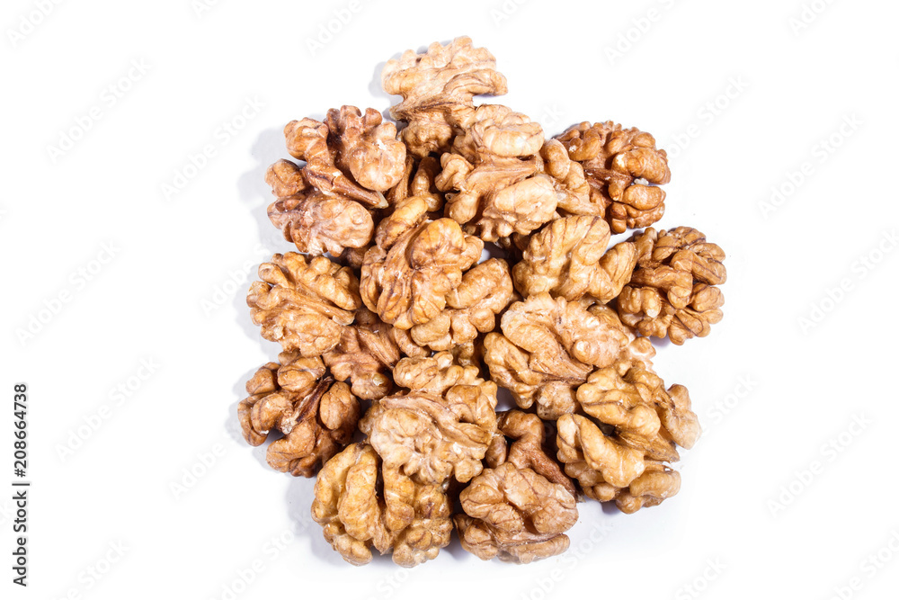 Pile of walnuts isolated on white background. Pile of walnuts isolated on white background.