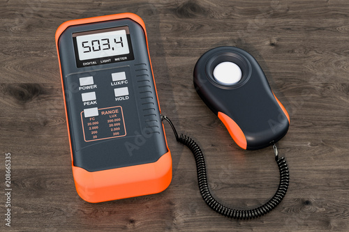 Digital luxmeter, light meter on the wooden table. 3D rendering