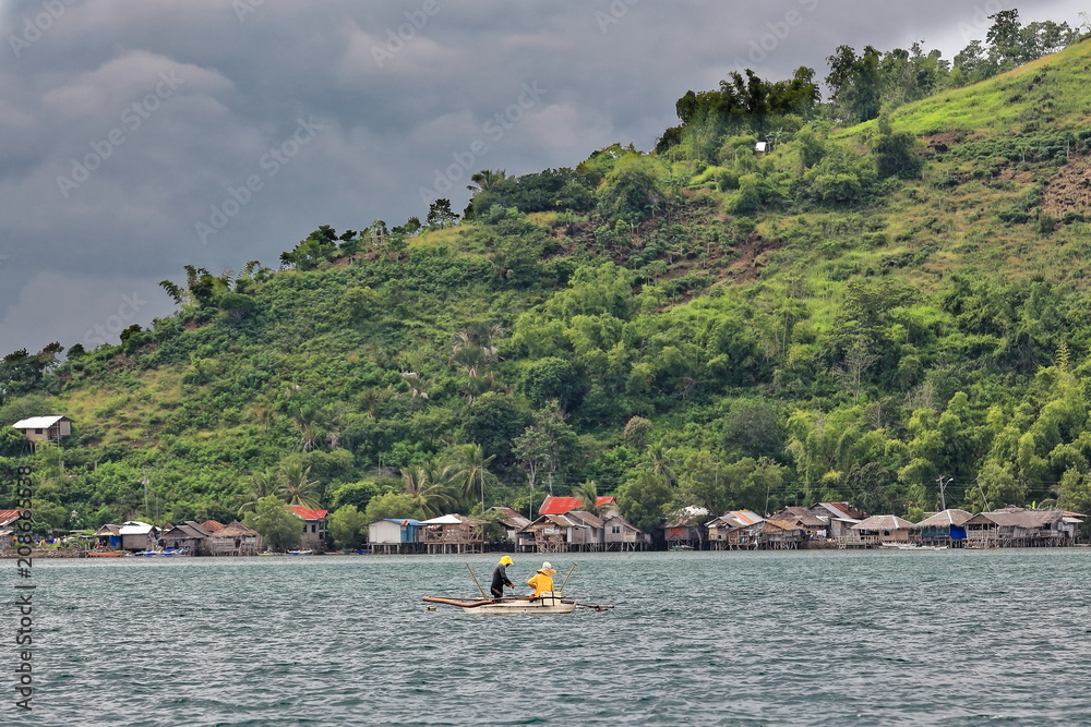 Dewey island coastline-vernacular stilt houses on North Bais Bay. Negros Oriental-Philippines.0524 Dewey island coastline-vernacular stilt houses on North Bais Bay. Negros Oriental-Philippines.0524