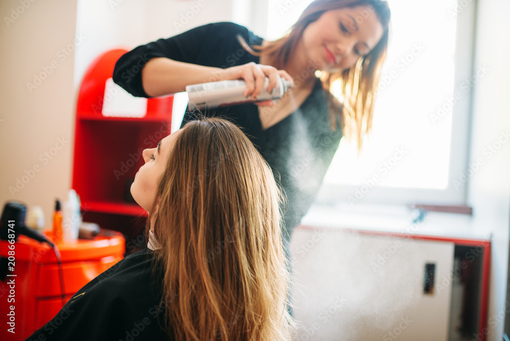 Stylist is preparing to apply mousse, hairdressing Stylist is preparing to apply mousse, hairdressing