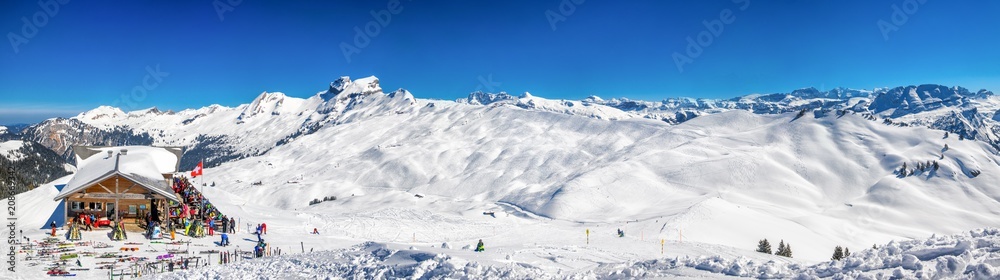 Beautiful winter landscape. Chalet covered by fresh snow in Hoch Ybrig ski resort, Switzerland, Europe