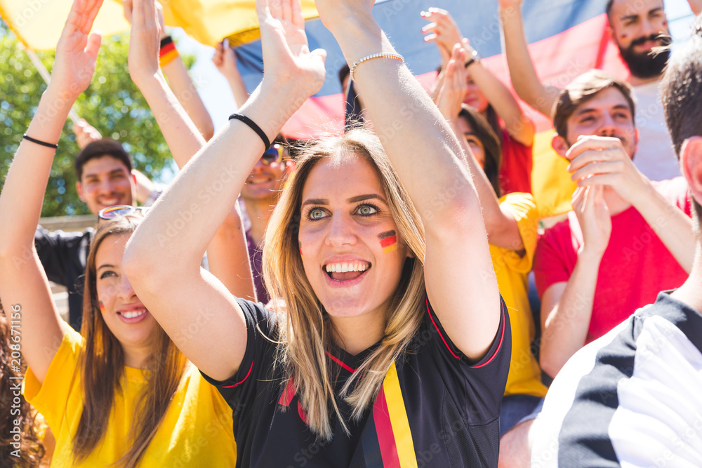 Obraz premium German supporters celebrating at stadium for football match