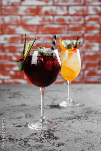 Red and white wine sangria with ice. photo