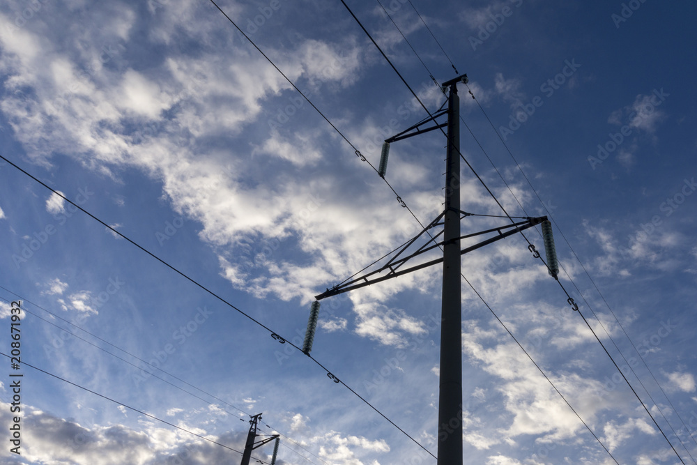 Power line against the sky with beautiful clouds Power line against the sky with beautiful clouds
