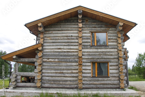The house for rest from natural wood, dry logs.