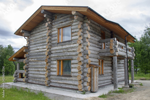 The house for rest from natural wood, dry logs.
