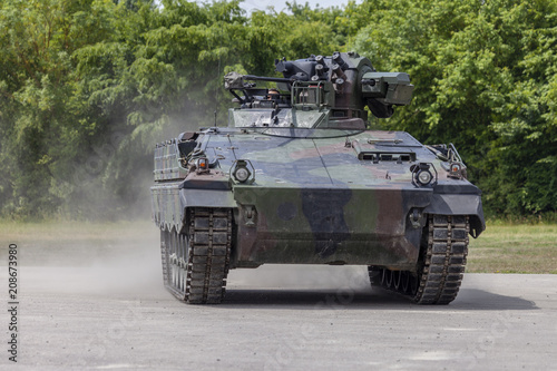 Foto German infantry fighting vehicle drives on a road