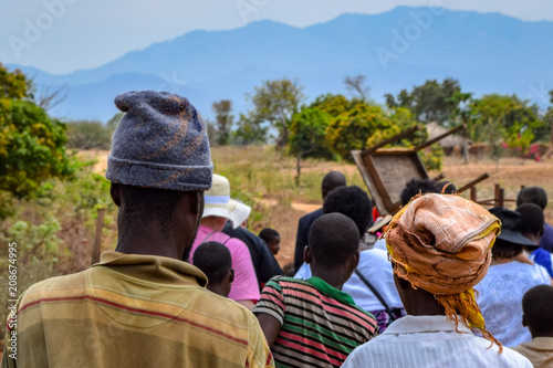 Family of villagers walking to church in Malawi, Africa