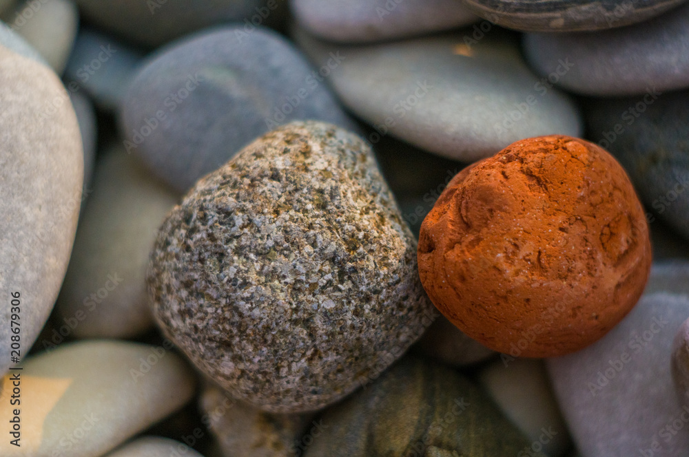 boulders and colorful pebbles on the beach boulders and colorful pebbles on the beach