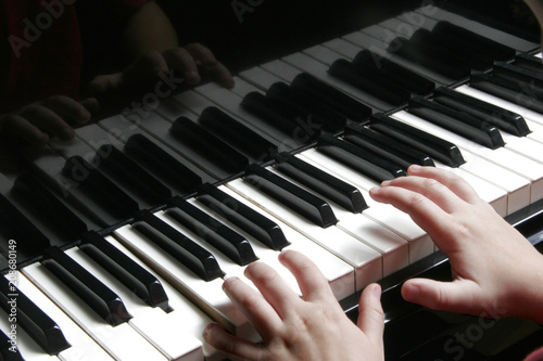 Young hands at the Piano