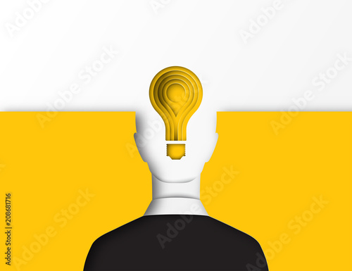 Layered cut out colored paper human back view and light bulb. Businessman in business suit. Inspiration, creativity and idea concept. Deep paper art style