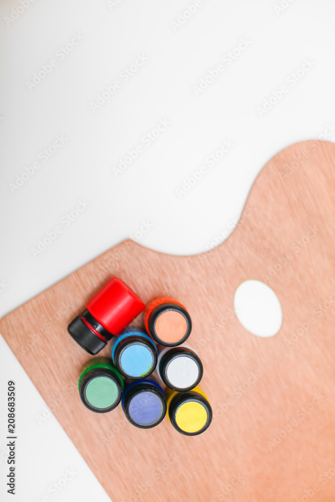 wooden art palette with paint isolated on white. top view with copyspace wooden art palette with paint isolated on white. top view with copyspace
