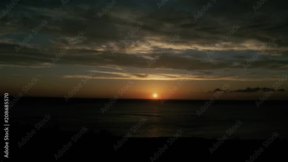 Kona Kailua sunset disappears in the Pacific Ocean. Drone video on the Big Island of Hawaii before the volcano erupted. Kona Kailua sunset disappears in the Pacific Ocean. Drone video on the Big Island of Hawaii before the volcano erupted.