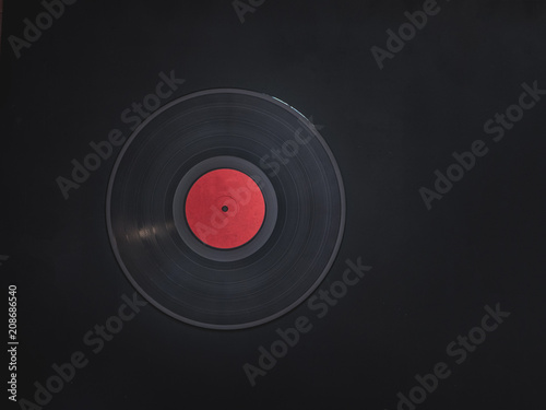 blank abstract vinyl record without text on black dark surface with copy space mockup