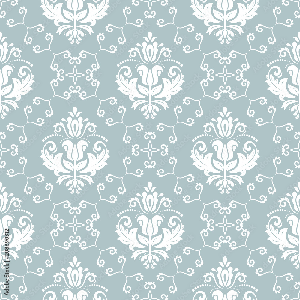 Classic seamless vector pattern. Damask orient ornament. Classic vintage light blue and white background. Orient ornament for fabric, wallpaper and packaging Classic seamless vector pattern. Damask orient ornament. Classic vintage light blue and white background. Orient ornament for fabric, wallpaper and packaging
