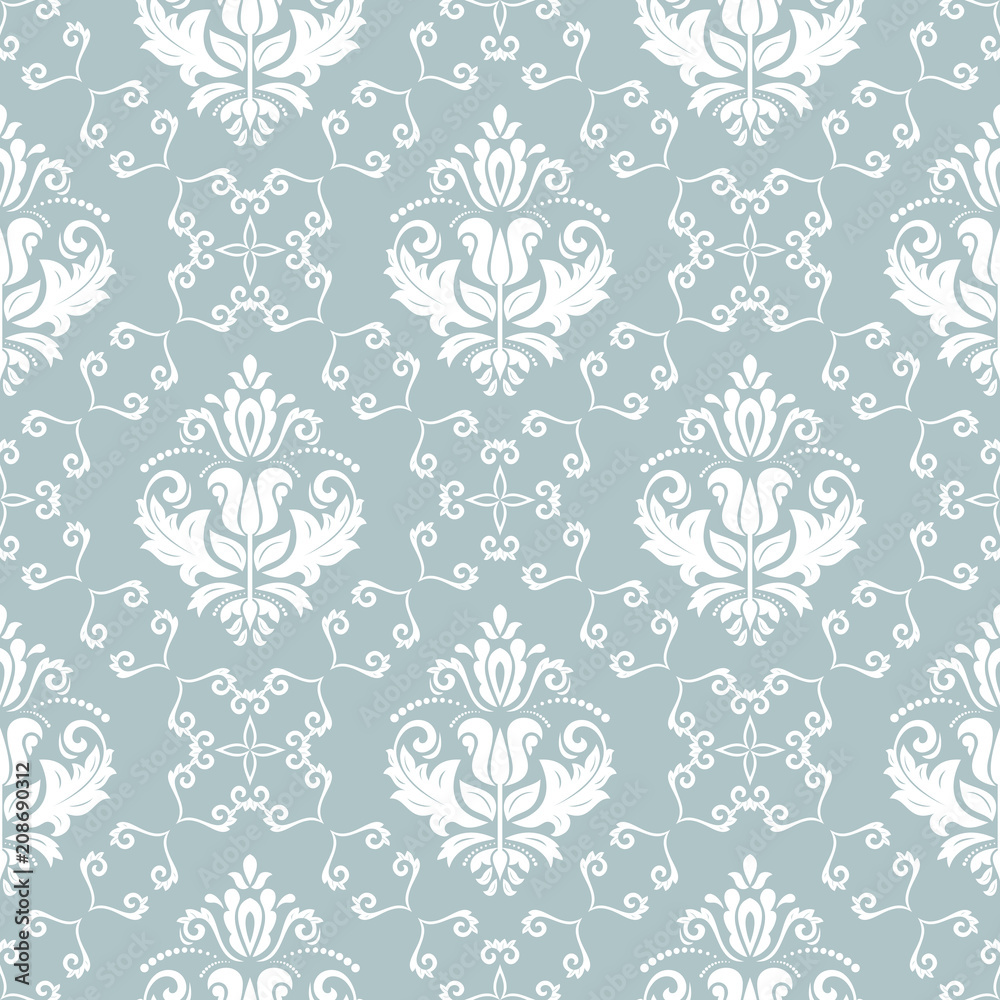 Classic seamless vector pattern. Damask orient ornament. Classic vintage light blue and white background. Orient ornament for fabric, wallpaper and packaging