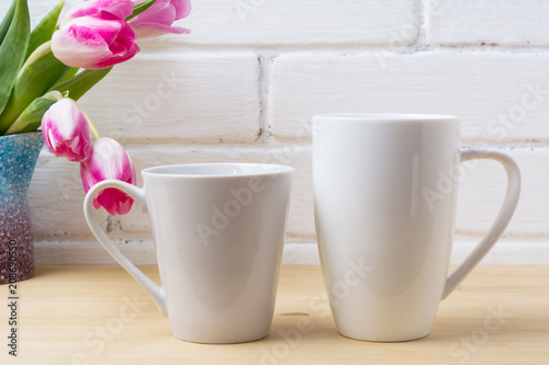 White coffee latte and cappuccino mug mockup with magenta tulip