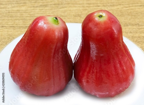 Two Red Water Apples on White Plate