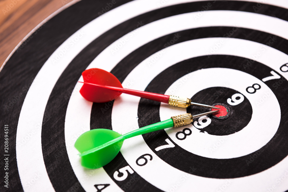 The darts on dark wooden background The darts on dark wooden background