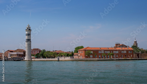 View of Murano island. In the foreground is the lighthouse of the island of Murano.