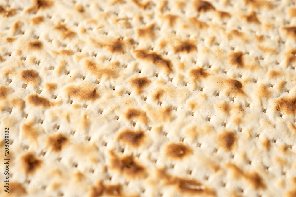 Matzah or flatbread closeup. Backgroun, food or texture. Matzah or flatbread closeup. Backgroun, food or texture.