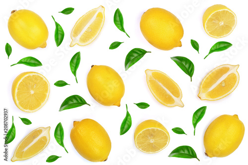 lemon and slice decorated with green leaves isolated on white background. Flat lay, top view