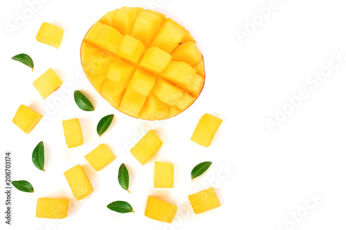 half of Mango fruit decorated with leaves isolated on white background with copy space for your text. Top view. Flat lay