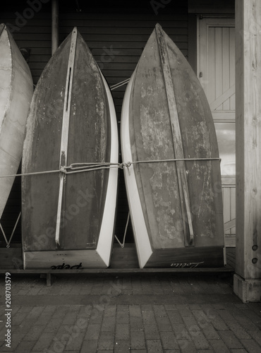 Wooden Rowboats leaning against a wall  © Jimmy