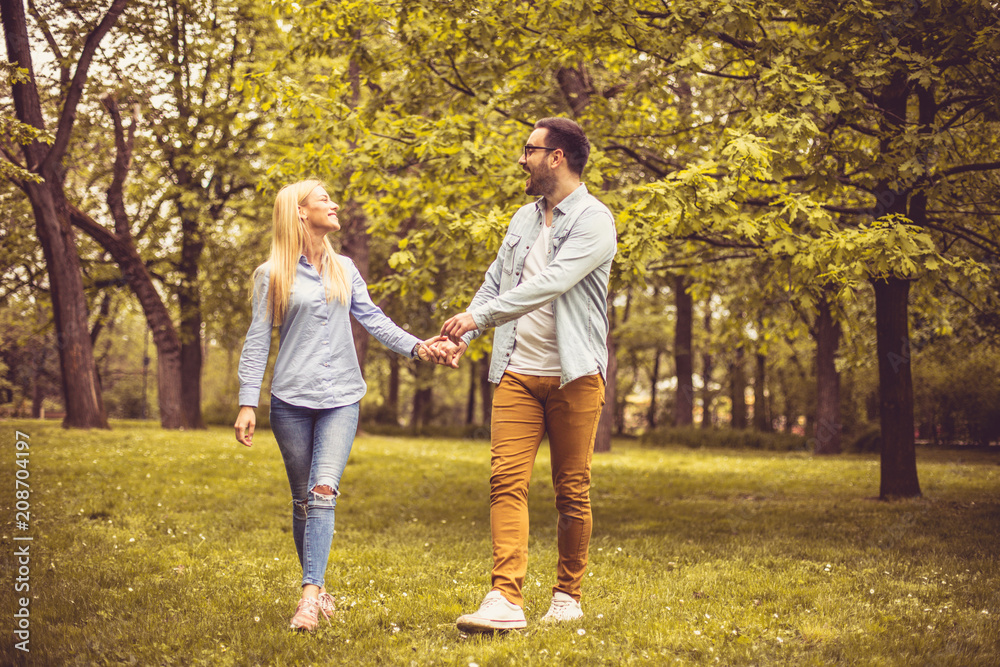 Fototapeta premium Conversation and fun at park.