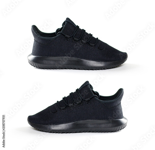 Men's black sports shoes. For sports. Isolated on white background
