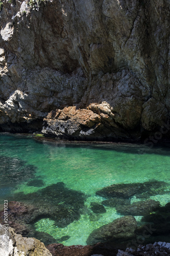 Beautiful azure water in secret cave