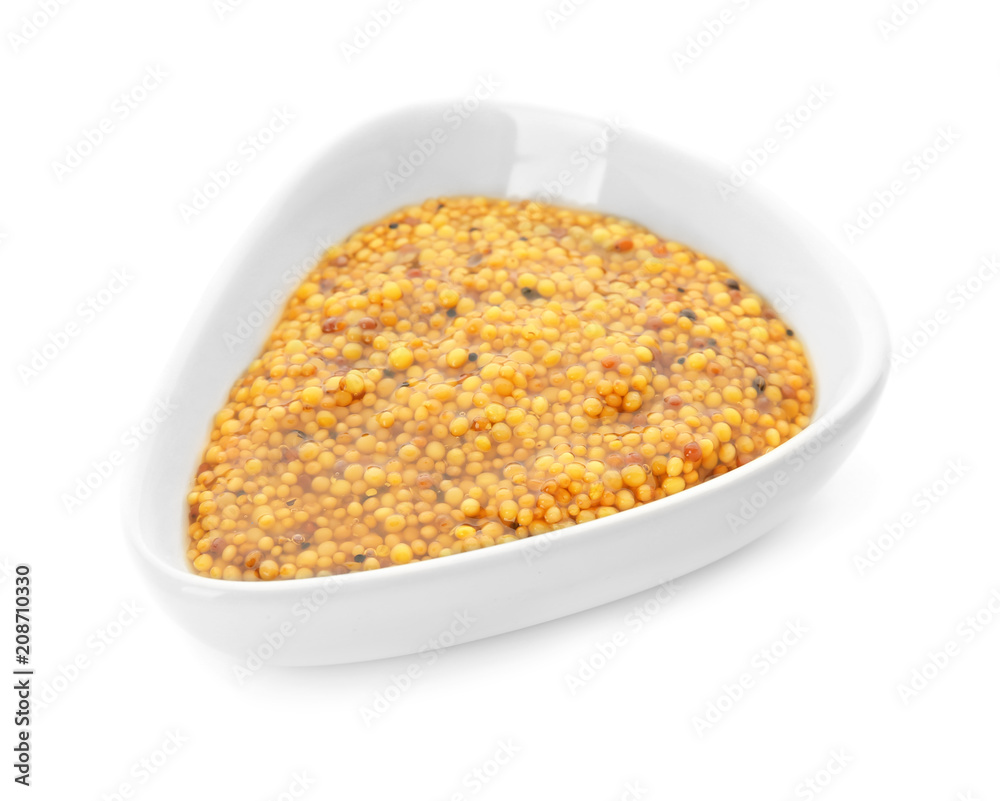 Dijon mustard in bowl on white background Dijon mustard in bowl on white background