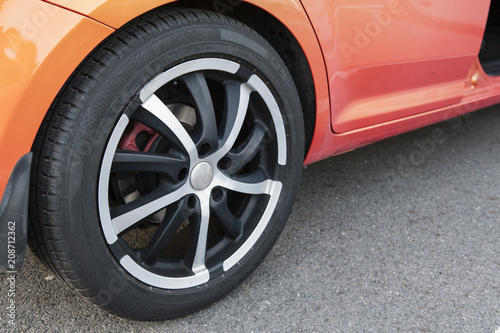 Rear aluminum rim and rubber from car. © lapis2380