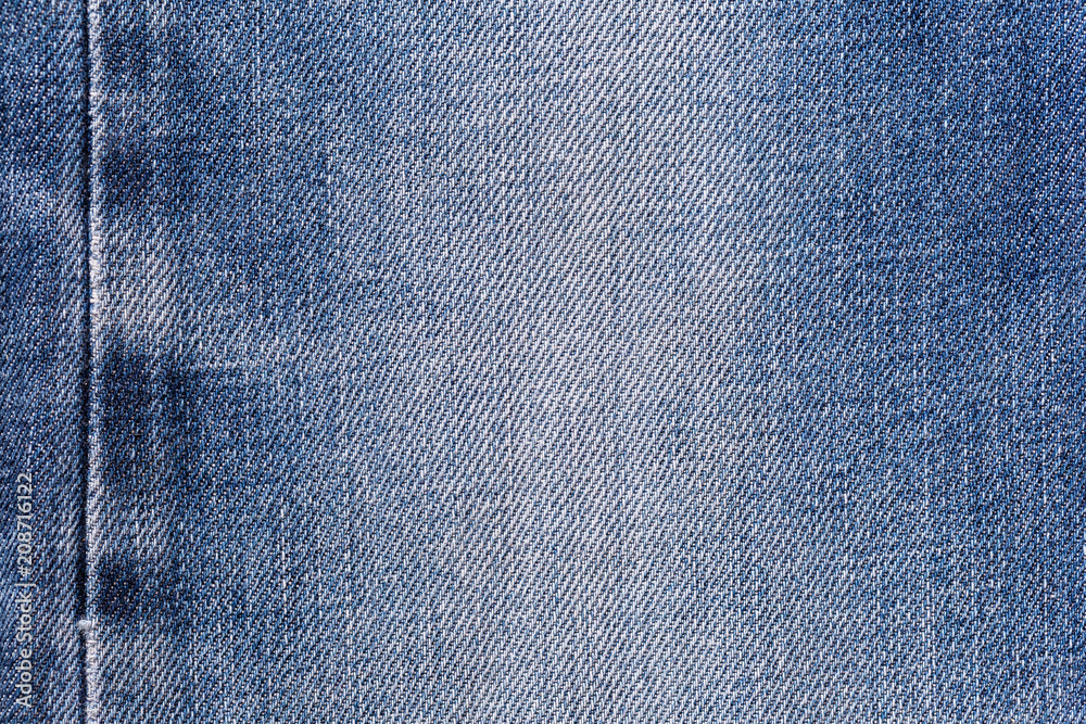 Denim jeans fabric texture background with seam for clothing, fashion ...