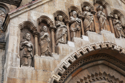 Statues of Saints on the wall of Jaki chapel in Budapest photo