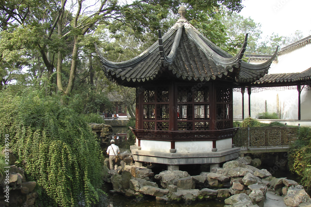 elegant pavilion and a pond in classical Chinese style, Suzhou (China) elegant pavilion and a pond in classical Chinese style, Suzhou (China)