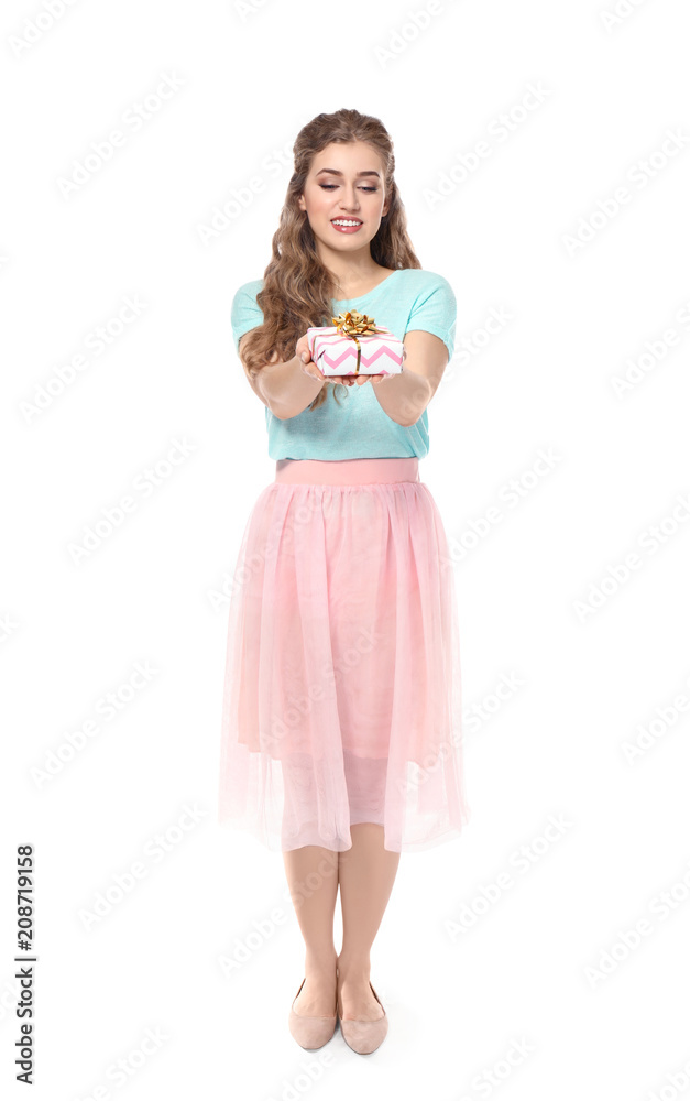 Beautiful young woman with gift box on white background Beautiful young woman with gift box on white background