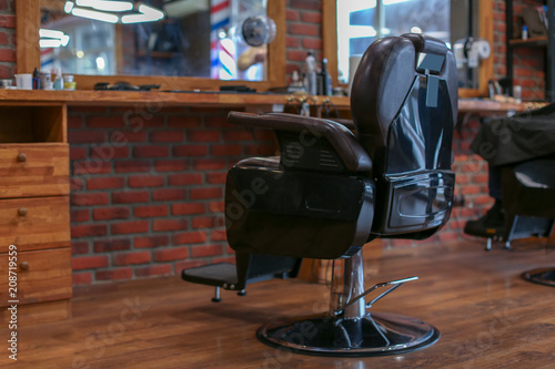 Leather chair in modern hairdressing salon © Pixel-Shot