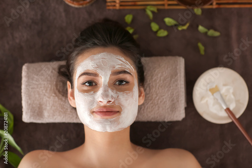 Young woman with face mask ...