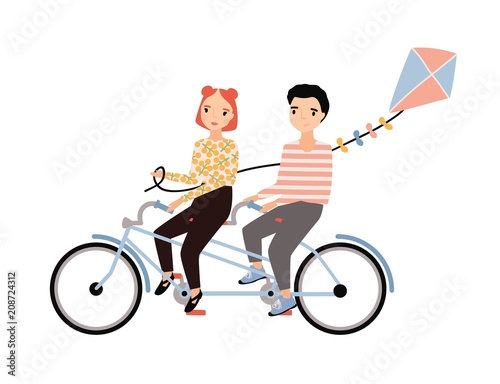 Cute couple dressed in trendy clothes riding tandem bicycle and holding kite. Young man and woman sitting on bike isolated on white background. Colorful vector illustration in flat cartoon style.