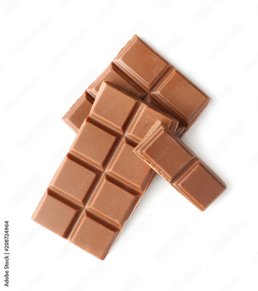 Pieces of milk chocolate on white background Pieces of milk chocolate on white background