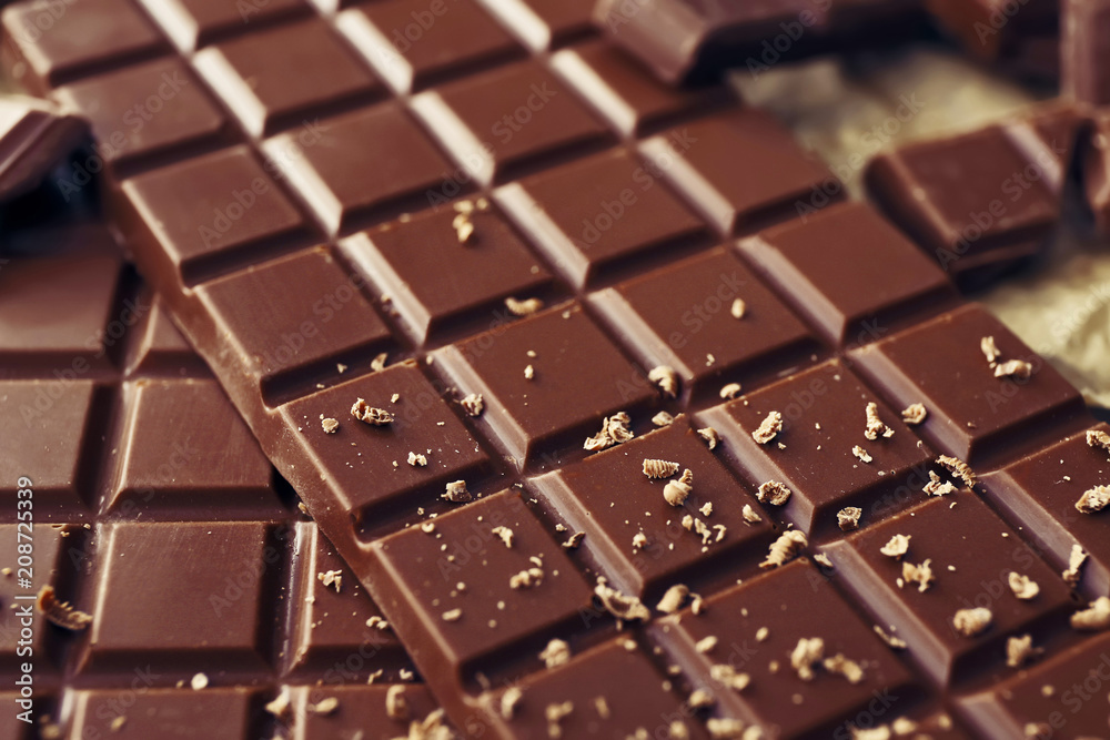 Tasty milk chocolate on table, closeup Tasty milk chocolate on table, closeup
