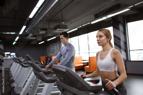 Young sporty woman and man ...